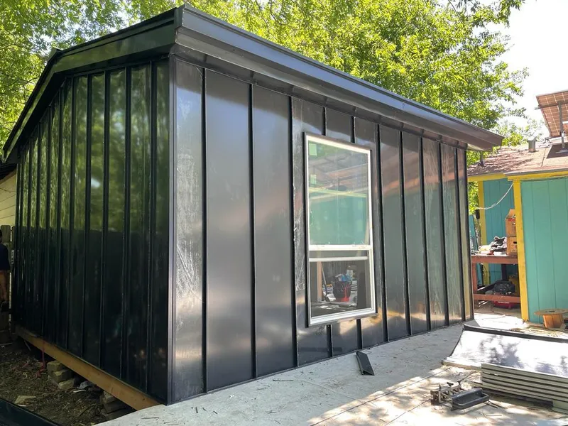 Black standing seam metal wall panels for Metal Roof Installation in Wheaton