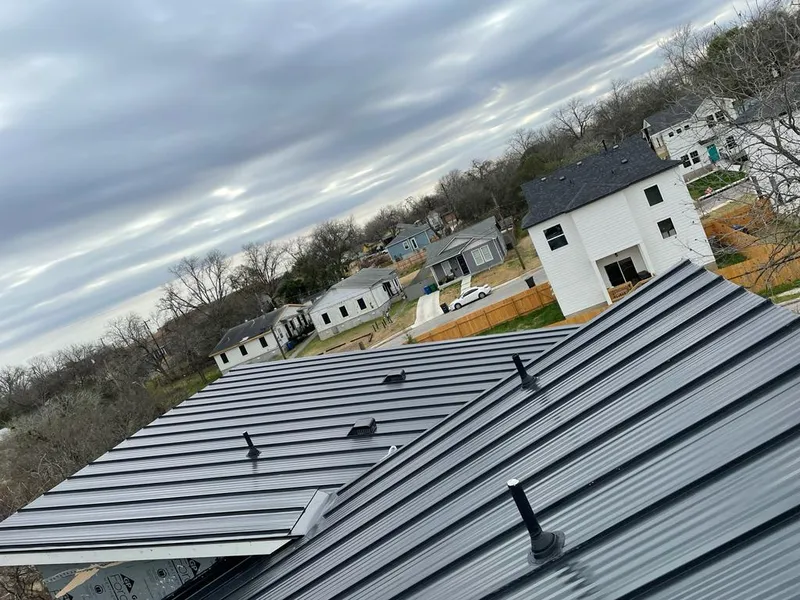 Standing seam metal roof panels with vents for Skylight Repair in Wheaton